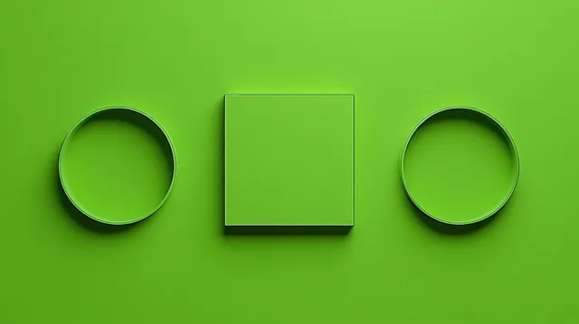 Two round and one square metal cookie cutters sit aligned on a bright green background with soft shadows.