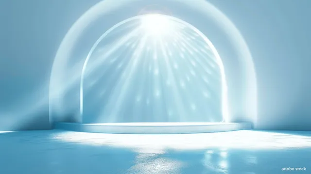 Minimal light blue studio stage with neon circular glow and soft radiant arch