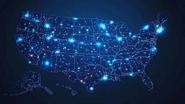 Glowing digital USA map with connected nodes and lines on a dark blue background.