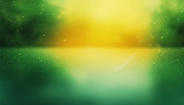 Soft impressionist landscape bokeh in warm yellow sunrise glow over fresh green haze