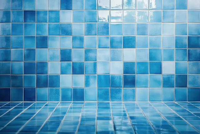 Serene blue mosaic tile wall in minimalist bathroom, glossy squares and soft light reflections