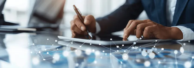 Business manager signing documents while data network overlays connect customers