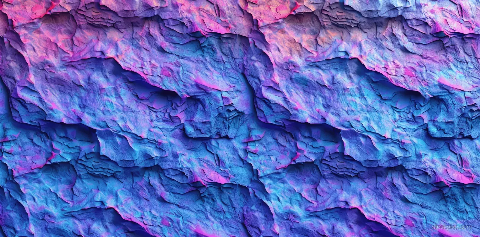 Seamless blue and purple slate rock wall texture with craggy slabs and rough, carved grooves.