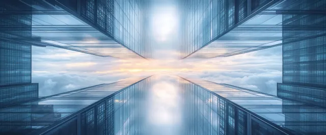 Futuristic glass skyscrapers frame a glowing sunset with cloud reflections and deep vanishing lines