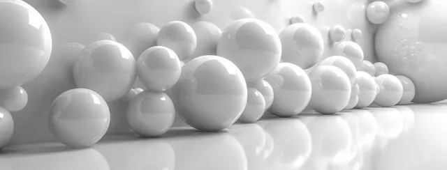 Dozens of smooth white spheres sit on a reflective surface against a soft gradient background with subtle glow.