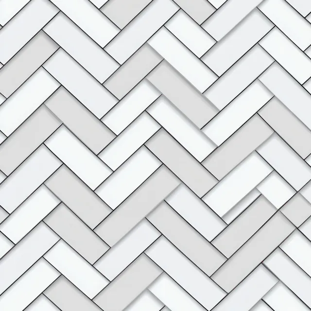 Close-up of white and light gray herringbone tiles with subtle shadows and crisp angular pattern lines.