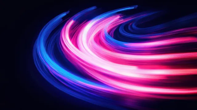 Swirling neon light trails in blue and pink streaks across a dark background