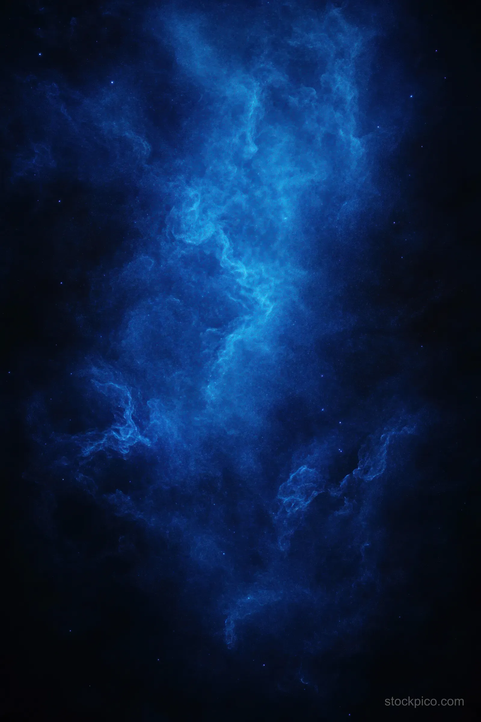 Glowing blue nebula cloud with scattered stars drifting through a dark outer space background.