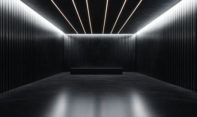 Minimalist dark room with ribbed walls, linear ceiling lights, and a central black bench reflected on a shiny floor.