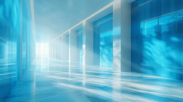 Corredor vazio de escritório moderno envidraçado com rastros de luz azul, paredes refletivas e longa perspectiva com ponto de fuga.