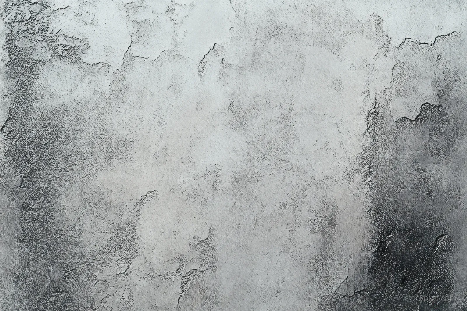 Rough concrete wall close-up with peeling paint exposing layered gray and white wear.