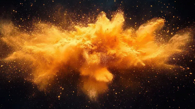 Orange powder explosion mid-air against black background with swirling particle cloud and burst