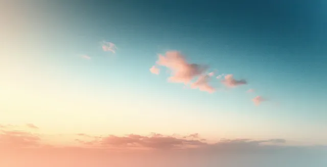 Pastel sunset gradient sky with soft clouds, airy blur texture background