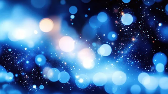 Glowing blue bokeh lights and sparkling particles forming a dreamy cosmic background haze