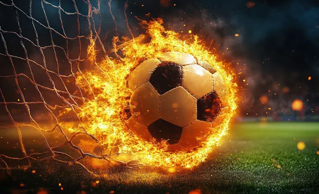 A glowing soccer ball on fire bursts through a goal net in a stadium field amid sparks.