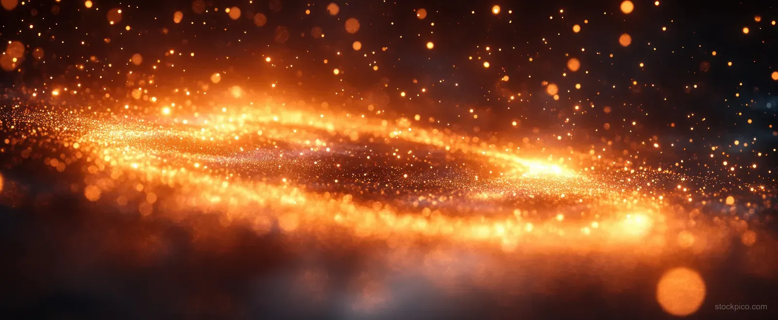 Glowing gold light streak and sparkling bokeh particles across a dark starry background.