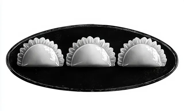 Three pleated half-moon dumplings arranged on a black oval plate on a light background.