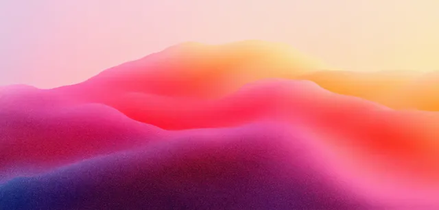 Pink and orange glowing gradient hills with soft blur and airy haze background