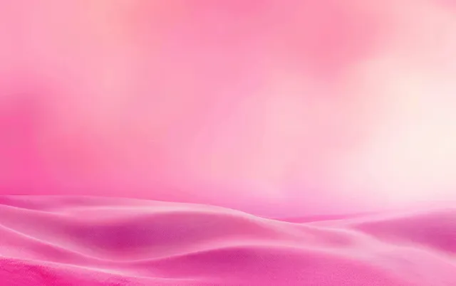 Soft pink fabric drapes with gentle folds and smooth highlights across a bright pastel pink gradient background.