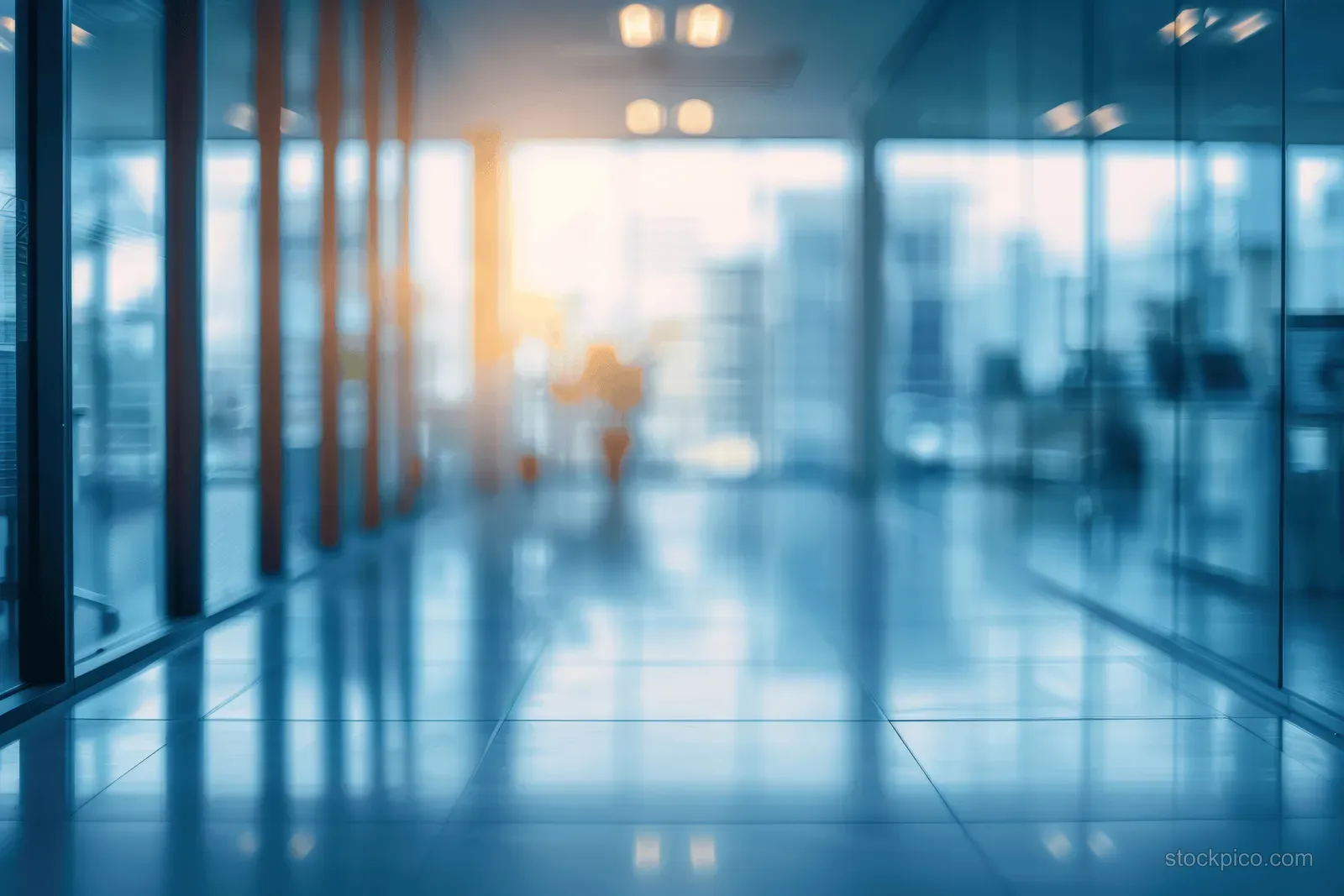 Defocused modern office corridor with panoramic windows, bright daylight, and soft interior bokeh lights.