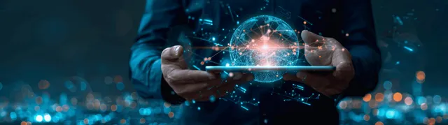 Businessman holding tablet projecting blue AI network hologram across global nodes