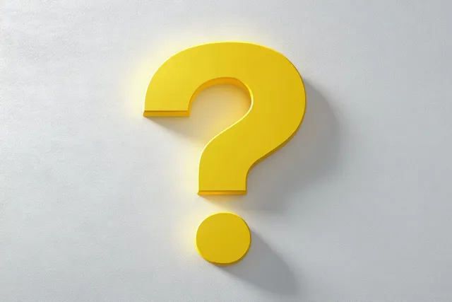 Bright yellow 3D question mark on textured gray wall with soft cast shadow