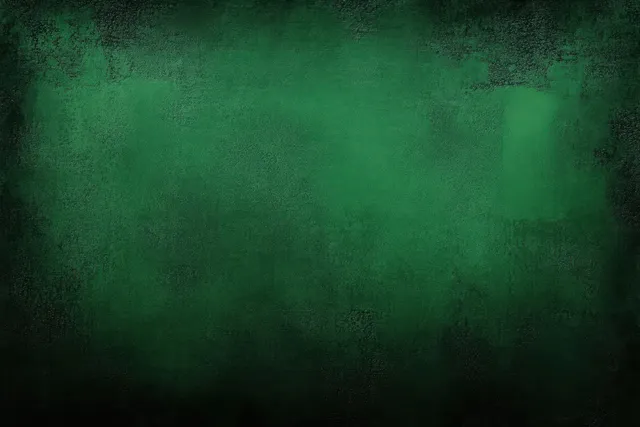 Dark green grunge texture background with uneven rough painted surface and shadowy mottled stains.
