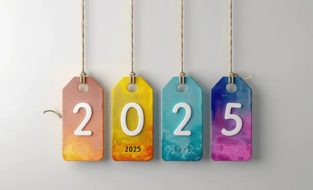 Colorful paper number tags for 2024 and 2025 hang from strings against a white background.