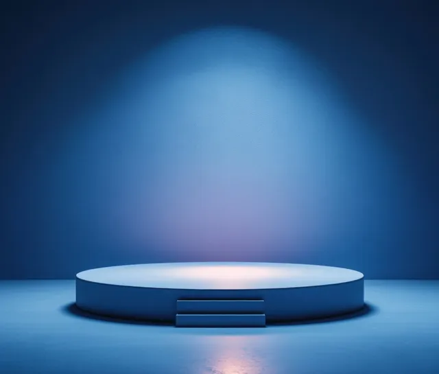 Minimal blue abstract podium on studio floor with soft gradient glow