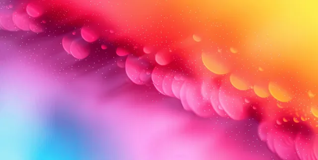 Fondo suave con degradado desenfocado en rosa, naranja y amarillo con gotas de bokeh brillantes sobre una textura granulada.