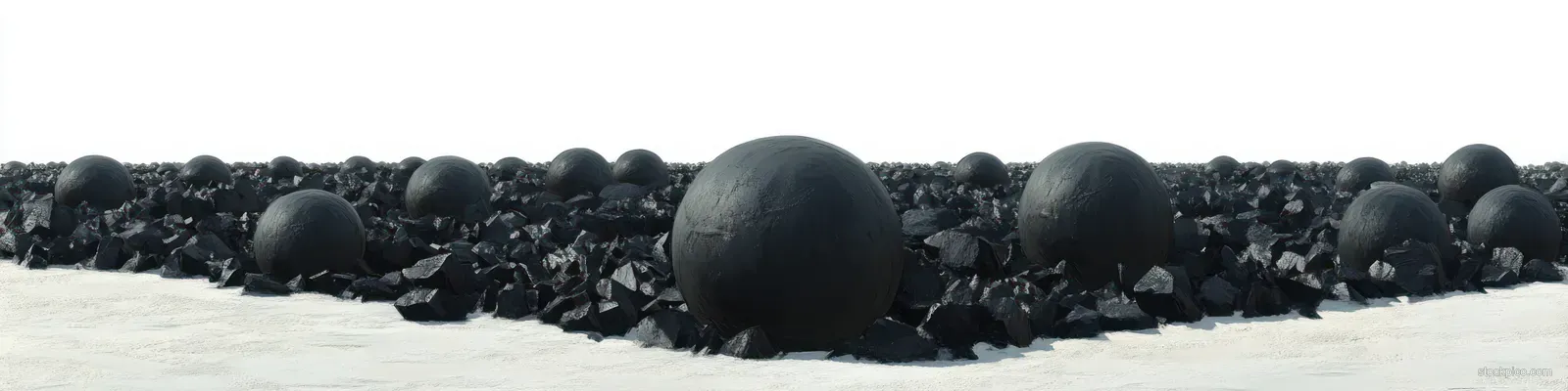 Black ice hockey pucks form a long pile on a snowy white desert floor beneath a bright horizon.