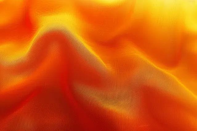 Orange and yellow gradient fabric texture background with soft blur top view copy space