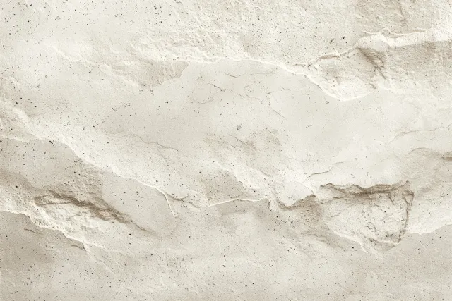 Beige concrete wall close-up with soft cracks and weathered plaster texture.