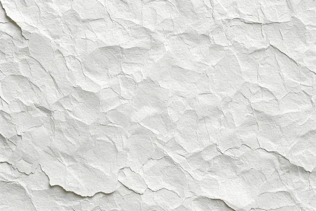 Crumpled white paper texture background with watercolor-like grain and subtle fold lines