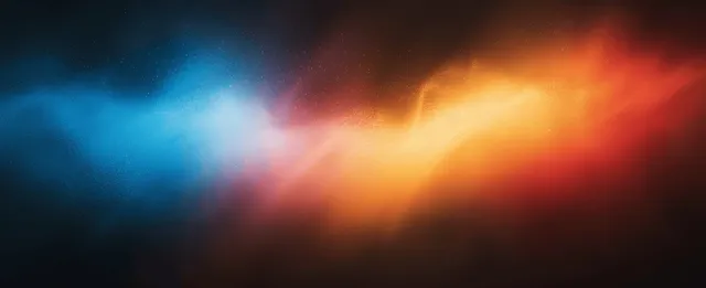 Abstract gradient blur shows red, blue, and orange light streaks over a dark grainy noise background.