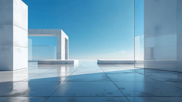Empty concrete terrace and minimalist building volumes with glass panels reflect a bright blue sky.