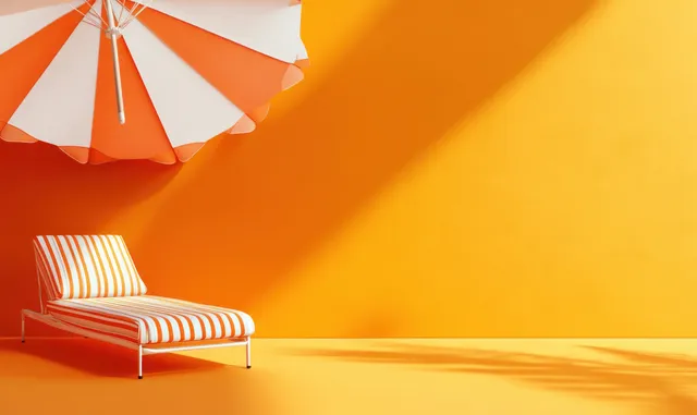 An orange and white beach umbrella shades a striped lounge chair on a bright orange background.