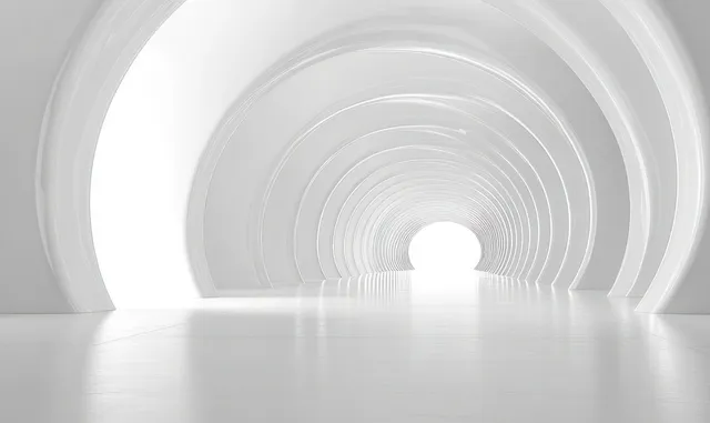 White curved tunnel corridor with reflective floor and repeating arches leading to blazing light