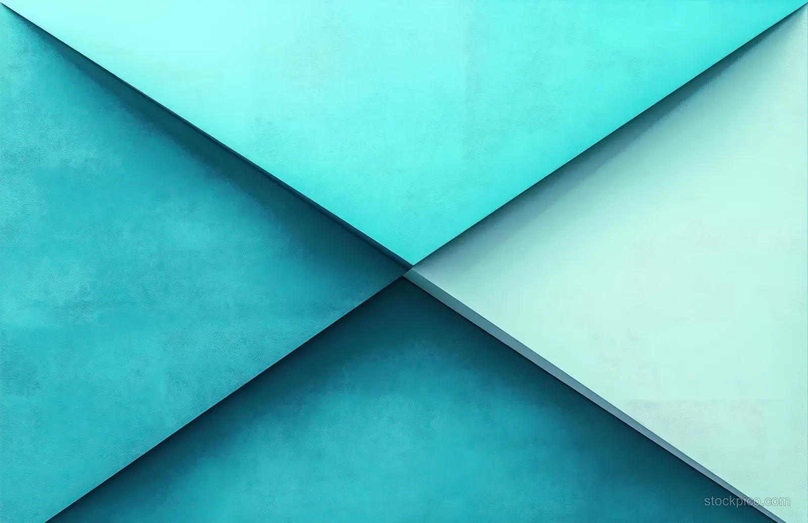 Overlapping turquoise and blue triangular panels intersect with visible texture, crisp edges, and shadowed depth.
