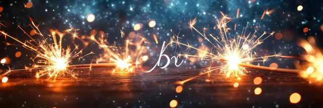 American flag held over wooden surface with sparklers glowing against night bokeh
