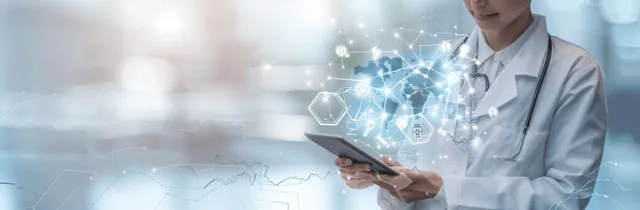 A doctor holding a tablet looks at holographic medical icons in a virtual healthcare interface.