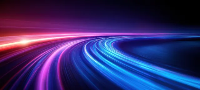 Neon blue and purple light trails streak across a dark highway-like tunnel