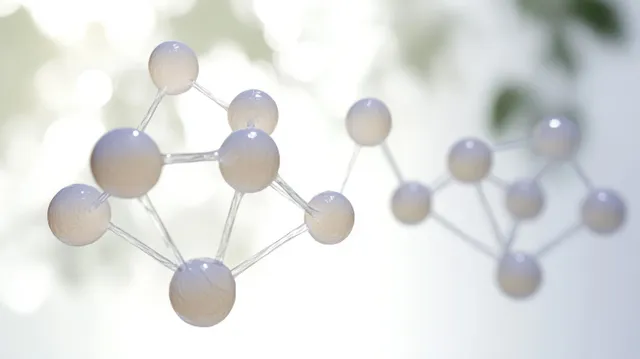 Abstract molecular model floating in soft light with glowing nodes and bonds