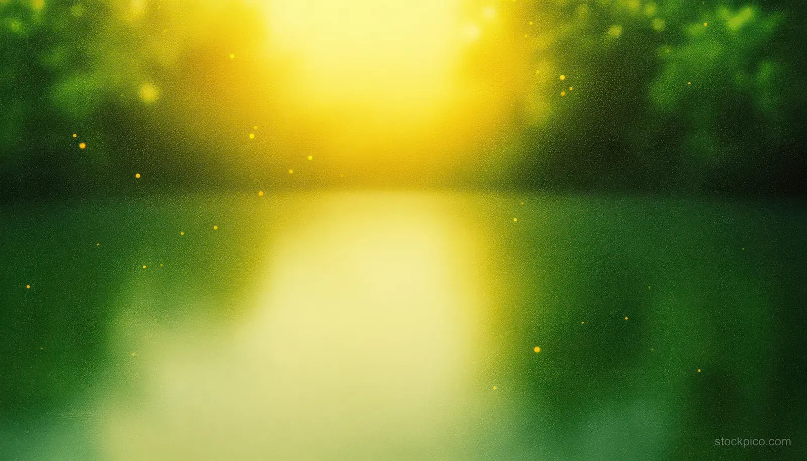 Misty abstract landscape with warm yellow glow and soft green bokeh light circles.