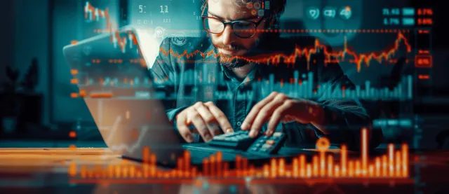A financial analyst typing with glowing stock charts, candlesticks, and chart bars overlaid in the background.