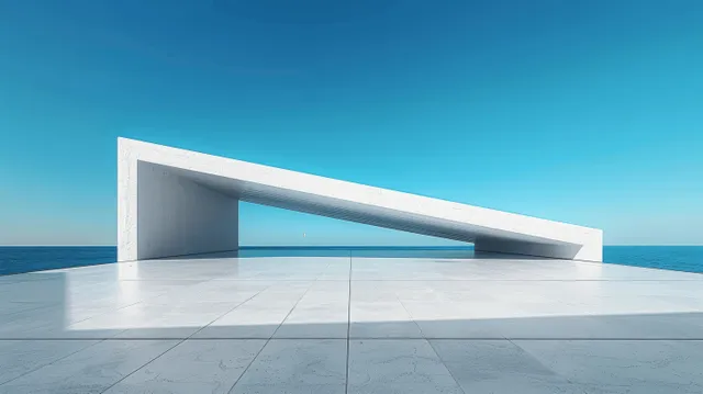 White minimalist concrete terrace with angled railing overlooks the ocean under a bright blue sky.