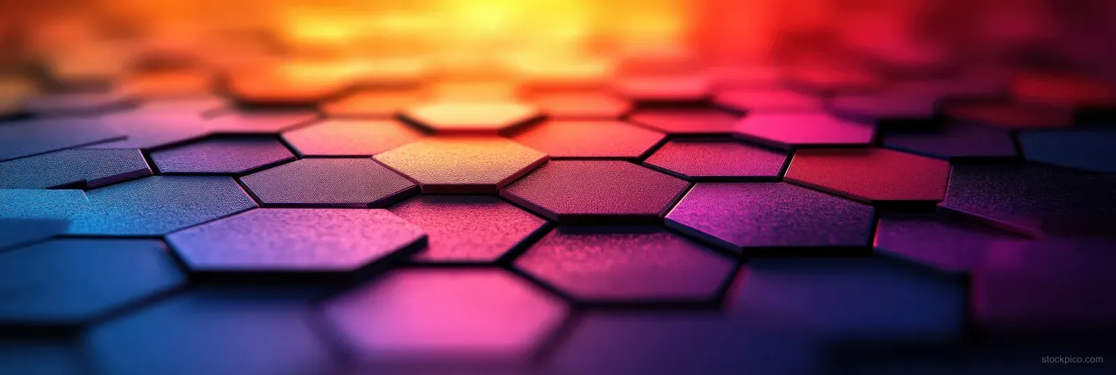 Colored pencil tips form a hexagonal gradient pattern fading from red to purple.