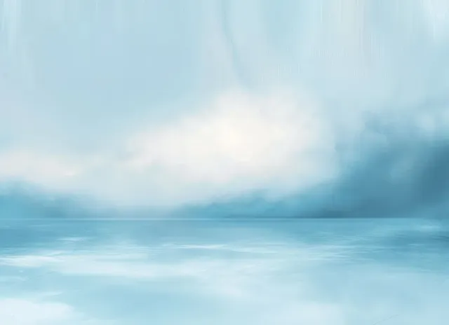 A smooth frozen lake under a pale blue overcast sky with faint reflections along the distant horizon.