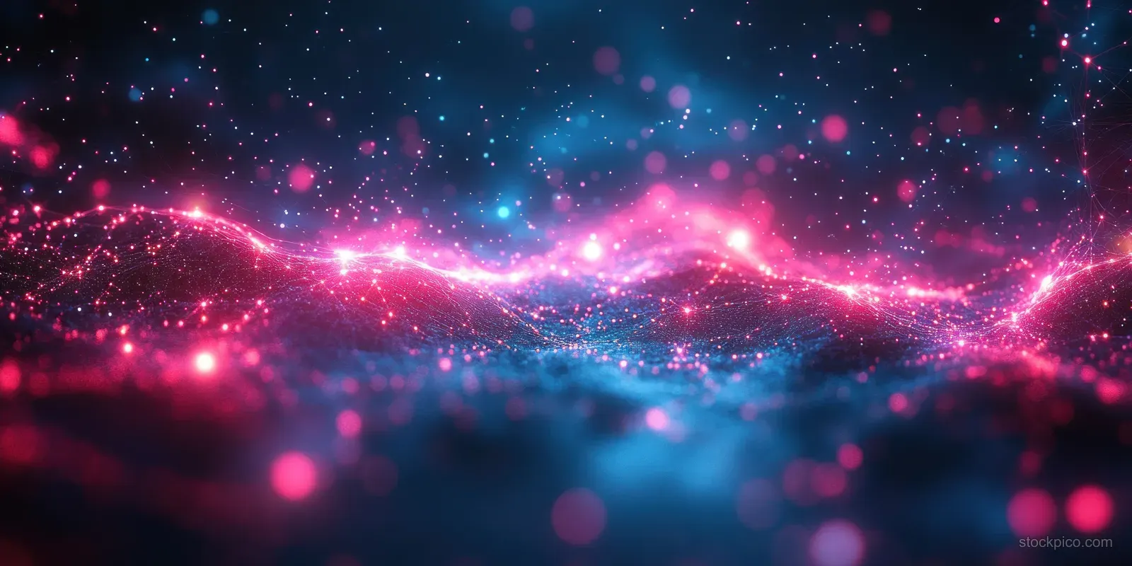 Neon pink and cyan nebula with glowing particles and light trails over a deep blue background.