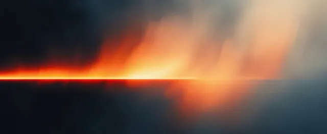 Warm orange and cool grey abstract gradient background with soft glowing blur textures